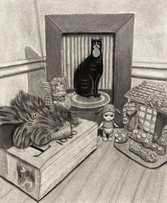 用木炭画猫的静物画